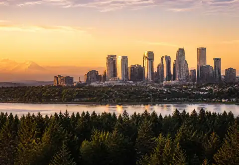 King County skyline at golden hour across Lake Washington